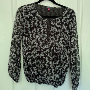 Classic black and white Vince Camuto blouse with elastic waist.